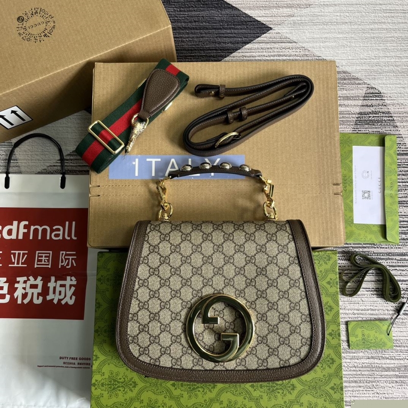 G*u*i top handle bags